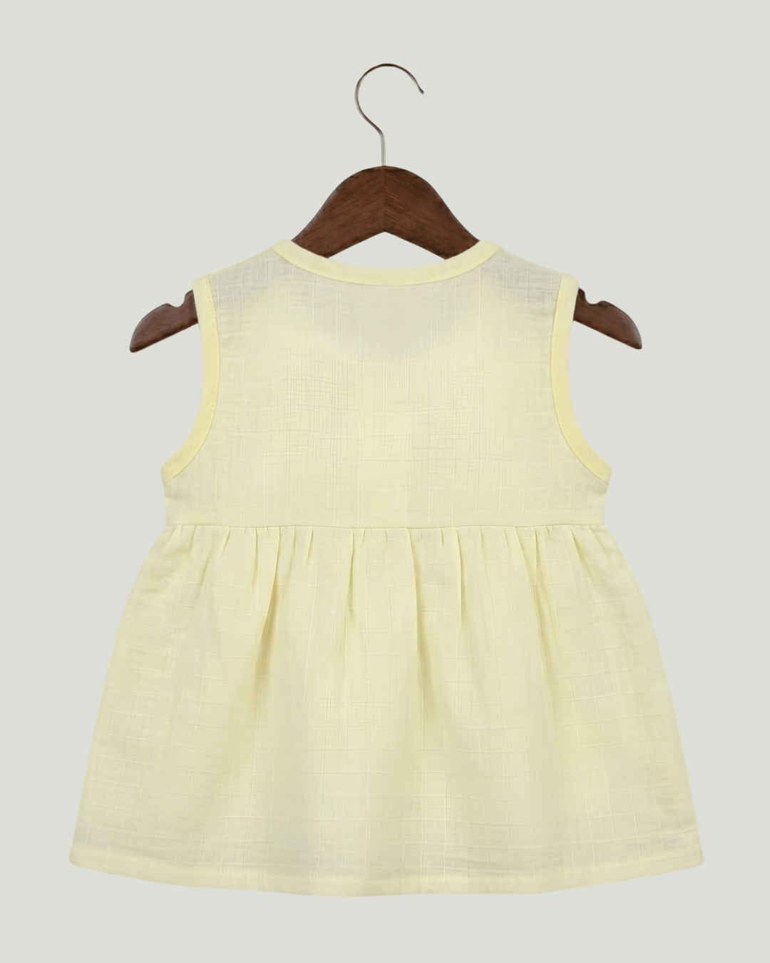 Premium Light Yellow Muslin Sleeveless Frock – 100% Organic Cotton Baby Dress