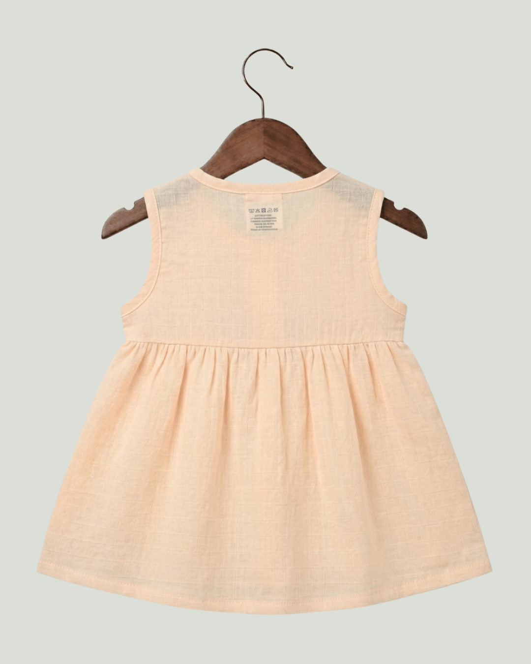 Premium Apricot Muslin Sleeveless Frock – 100% Organic Cotton Baby Dress